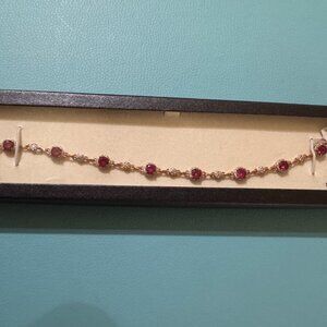 14k rose gold plated ruby tennis bracelet with lobster clasp closure